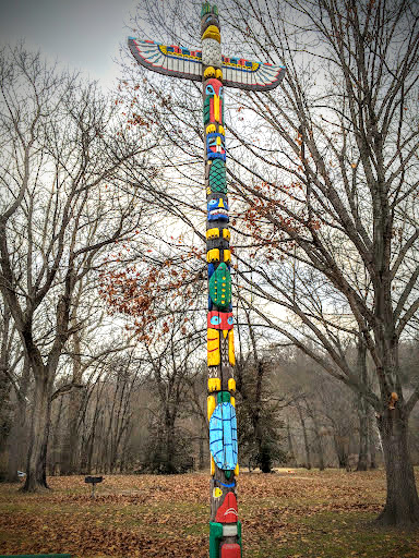Totem pole in Roubidoux Park. This work of art was created by members of a local woodcarving club in the late 1980's. Image by Laura Huffman.